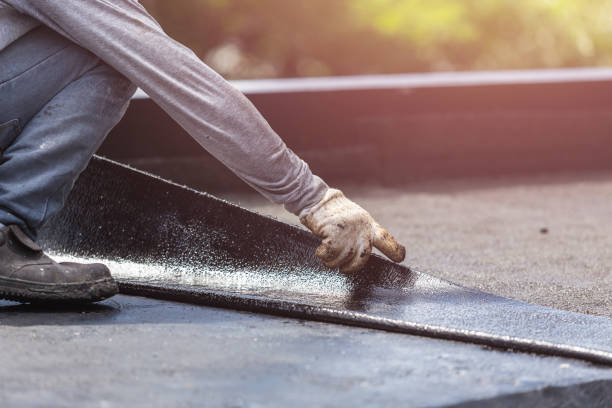 Professional Basement Waterproofing technician working in Haskell, NJ